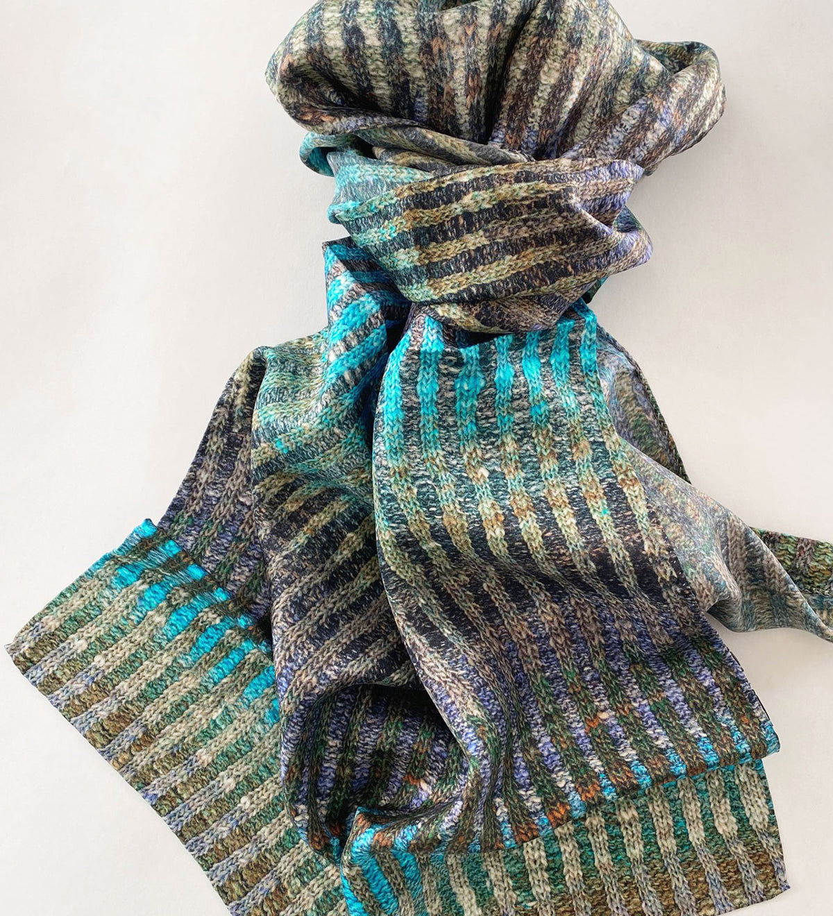 Printed silk scarves with knitted design by Penelope Cream.